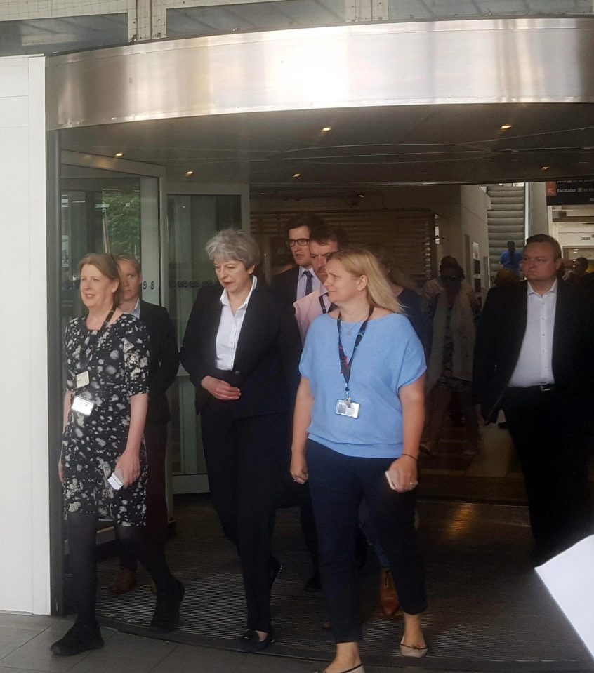  Mrs May snapped leaving the hospital around an hour later