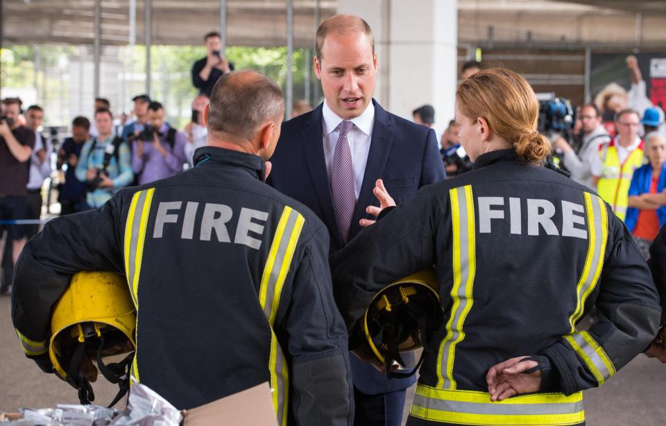  The Duke of Cambridge spoke to firefighters as he visited a relief centre this morning