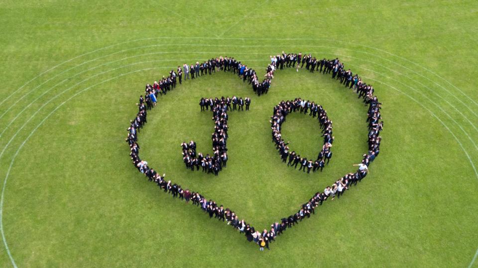  Pupils at Cockshut Hill School formed a heart-shaped human chain with the word Jo in its centre