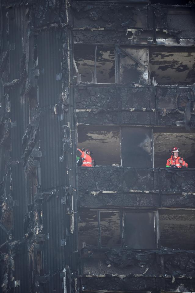  Specialists in a destroyed part of Grenfell Tower in Kensington, West London