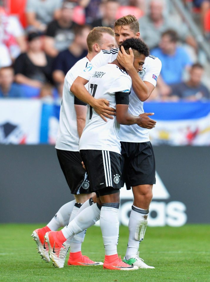  Serge Gnabry is congratulated by his team-mates after grabbing Germany's second