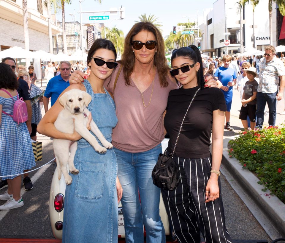  The trio strike a pose at the car show