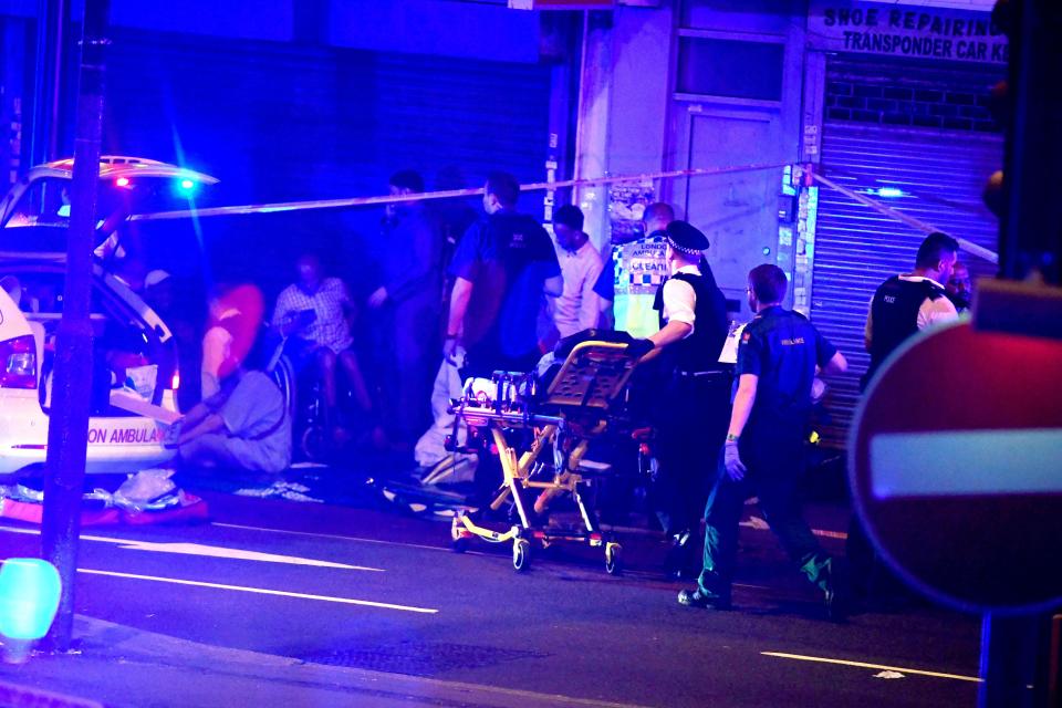  Paramedics from London Ambulance Service can be seen tending to people injured in the incident