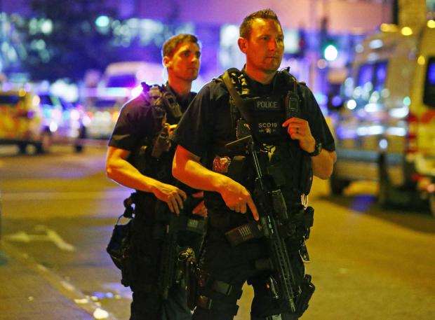 Armed cops are at the scene after the Met Police declared a "major incident" at Finsbury Park