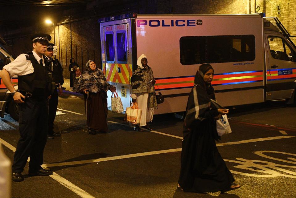  Onlookers near the mosque in Finsbury Park after the horrific attack just after midnight last night