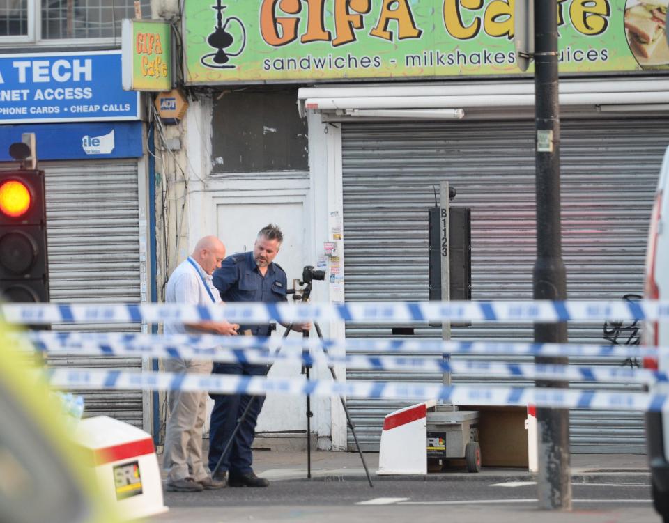  Investigators near the scene of the attack in north London