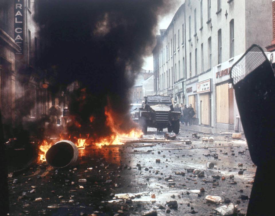  Flames from a petrol bomb blaze in the street in Londonderry in 1969