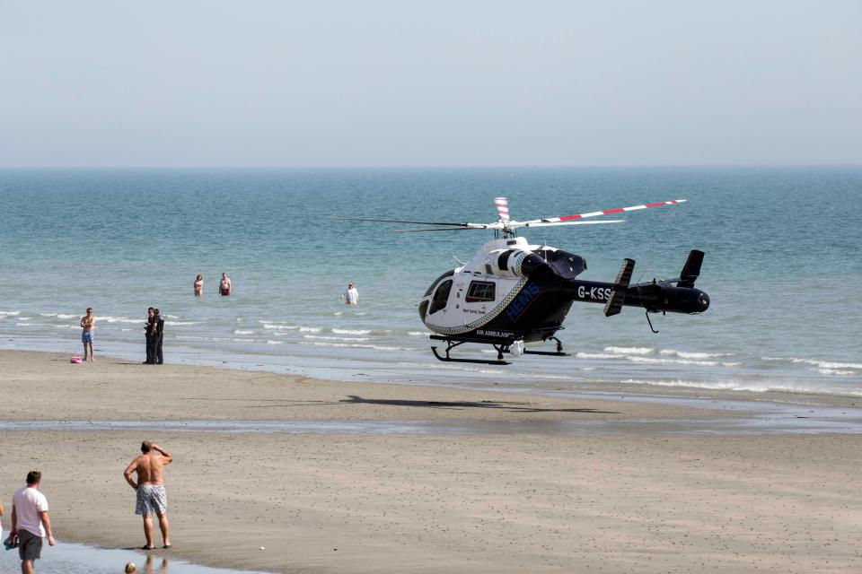  An emergency helicopter was scrambled to the beach at East Wittering, Sussex, yesterday where a woman died