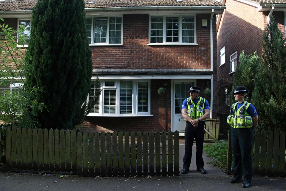  Police officers stand outside a residential property in Cardiff, south Wales as investigations continue into a van attack in Finsbury Park