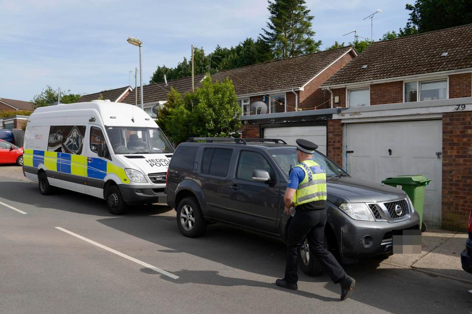  Cops outside the Cardiff home of suspect Darren Osborne