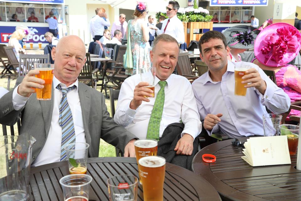  A group of pals headed straight for the bar and were spotted enjoying a pint in the sun