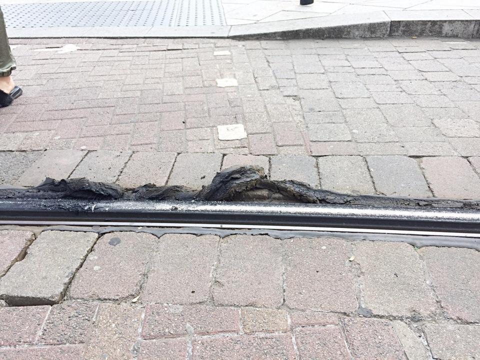  Asphalt also melted alongside tram tracks in Croydon, South London, this morning