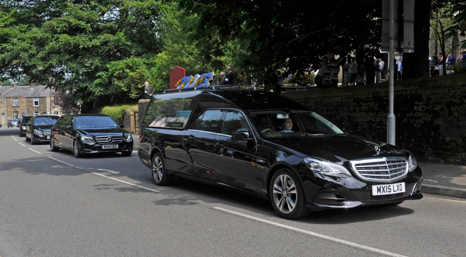 The coffin arrives at the church as dozens of mourners waited to say goodbye to the popular teenager