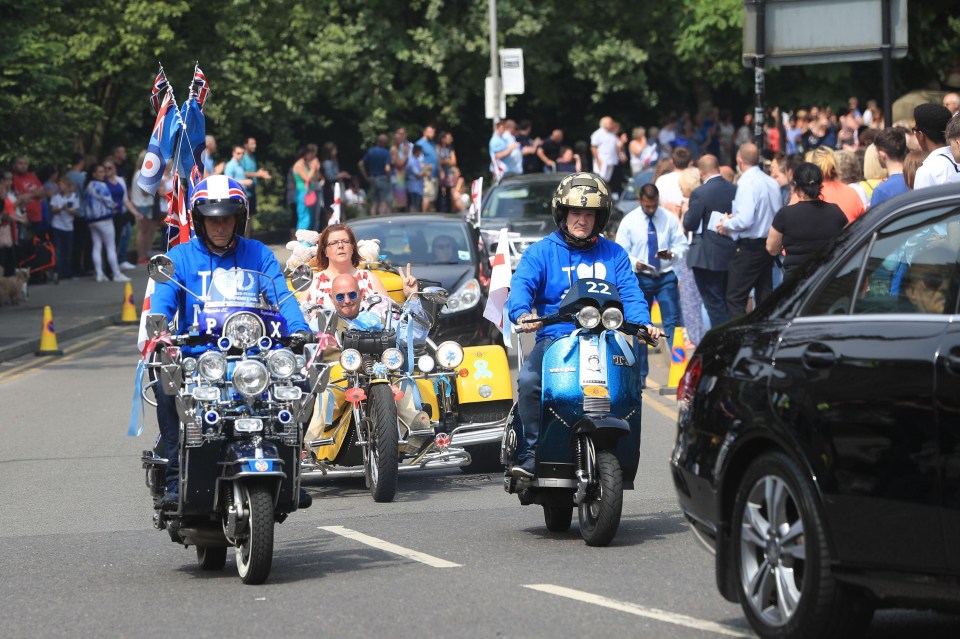 People riding scooters arrived at the church to say farewell to the teenager