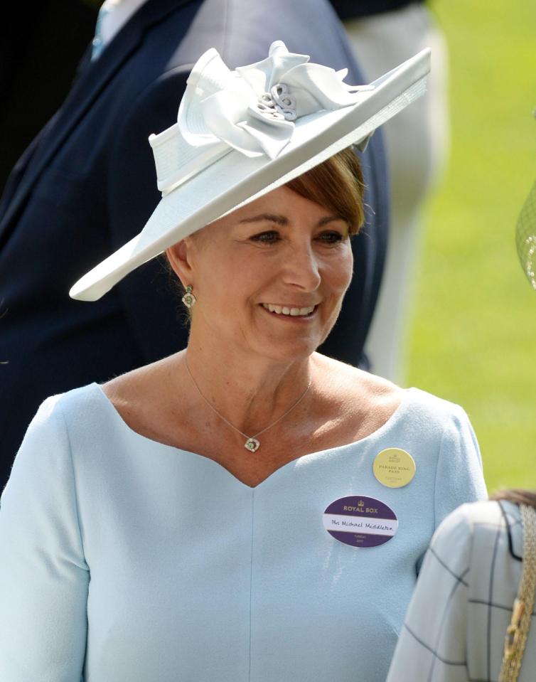  Carole Middleton looked sophisticated in a ice blue-coloured dress and a matching hat