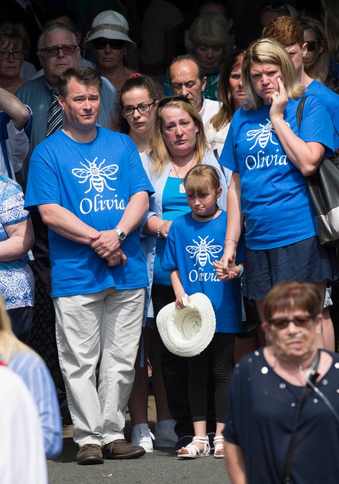  Lee Rigby's mum (centre) was pictured at the funeral