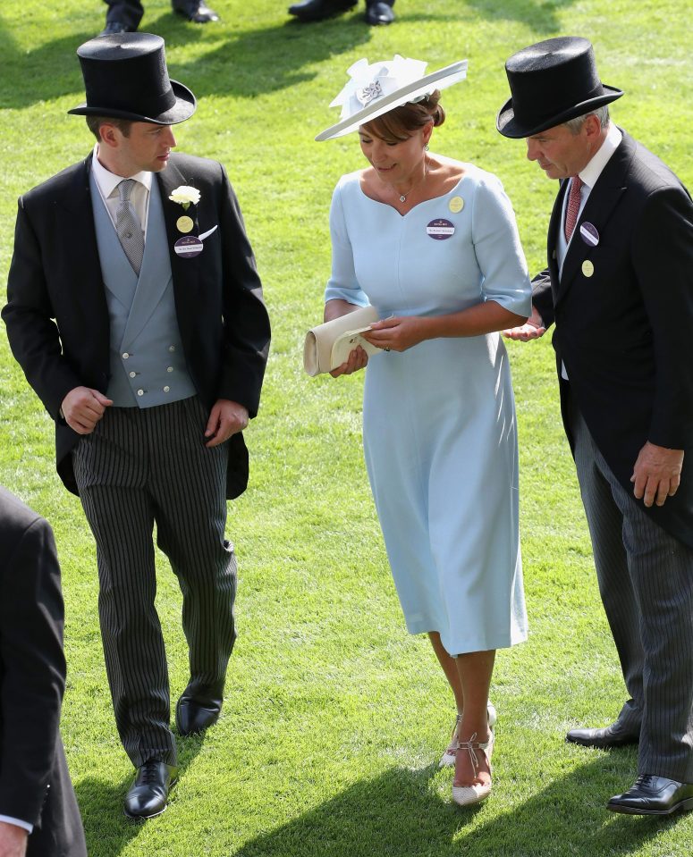  Carole arrived at Royal Ascot with her husband Michael, right, and was later spotted chatting to members of the royal family