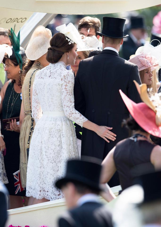  Kate was spotted placing her hand on William's bum after the trophy-giving ceremony as they chatted away to revellers