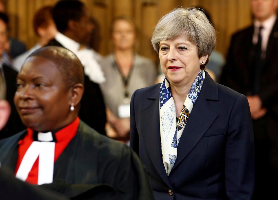  Theresa May walking through the Central Lobby of Westminster ahead of the Queen's Speech