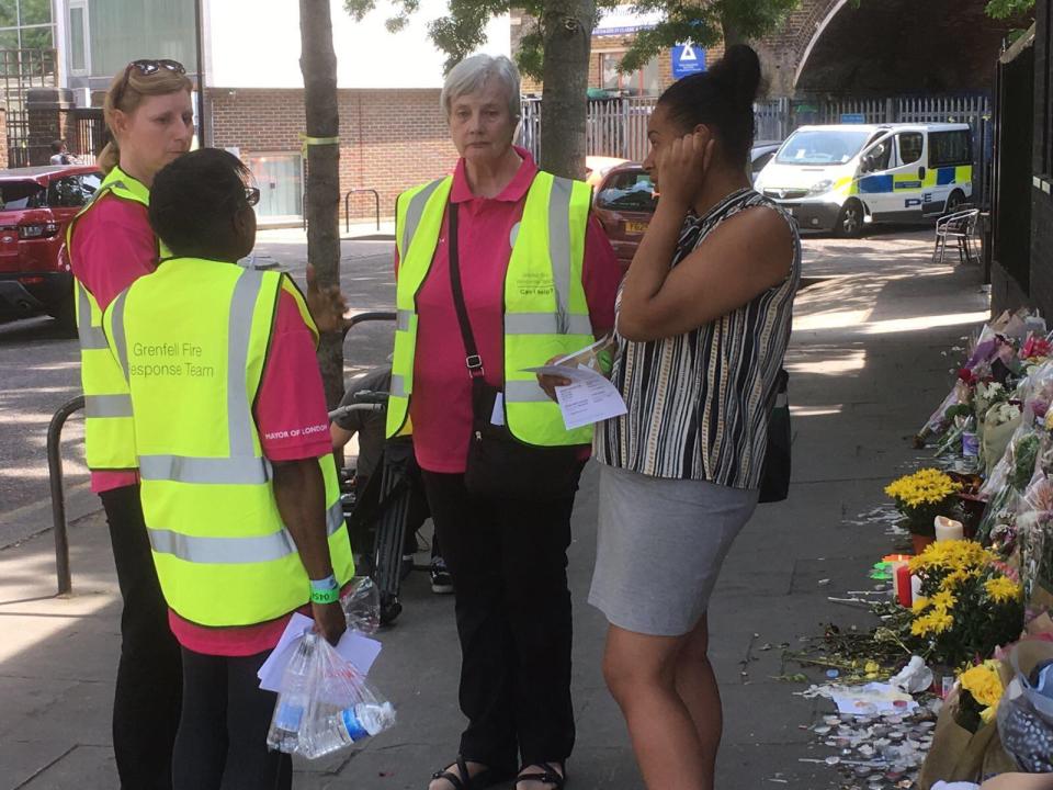  Volunteers from the Grenfell Response Team giving out information including where people can go for help