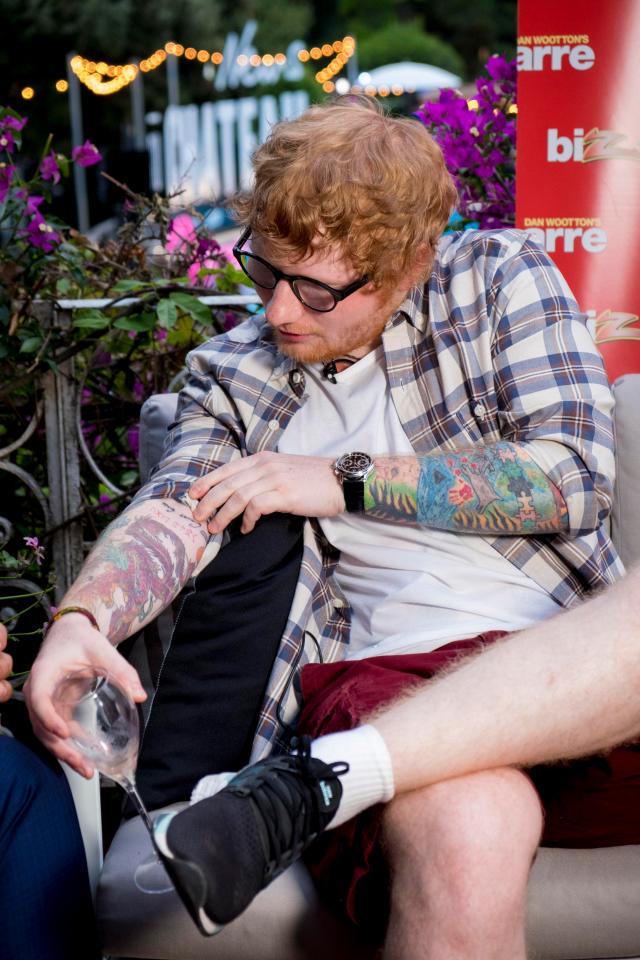  Ed showed off his impressive collection of tattoos