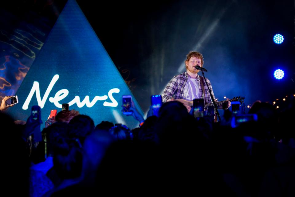  Gig-goers snapped at the chance to get a pic of Ed on stage