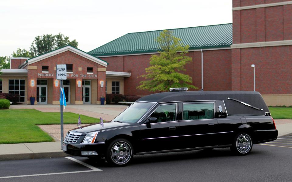  A hearse carrying the body of Otto Warmbier arrives at his memorial service