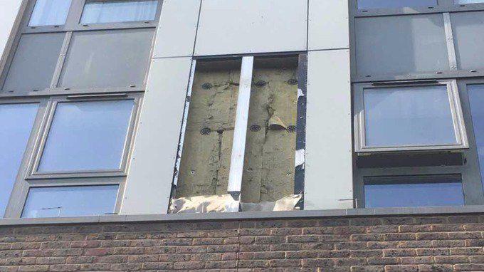  A piece of cladding has been removed by Camden Council workers