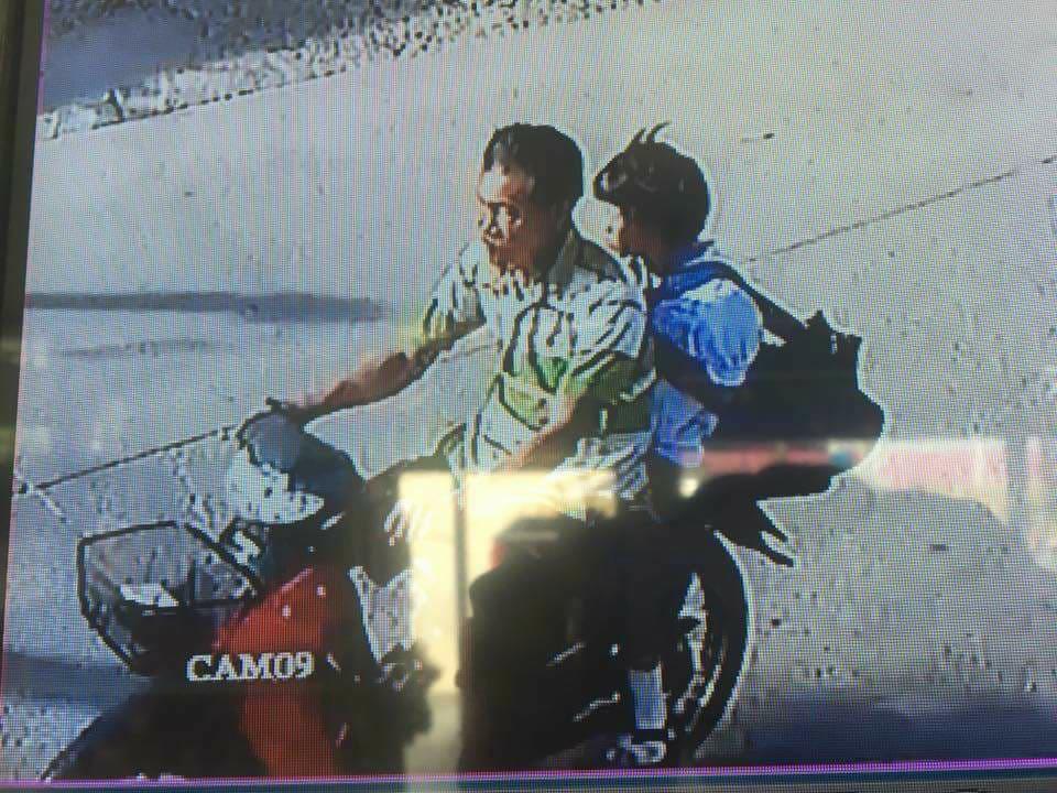  A CCTV image shows the moment schoolgirl Nong Pim was abducted by paedophile Wichai Chotisena