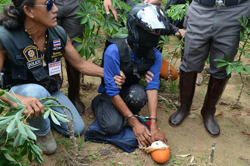  Wichai acted out throttling the youngster, with a doll standing in for the victim