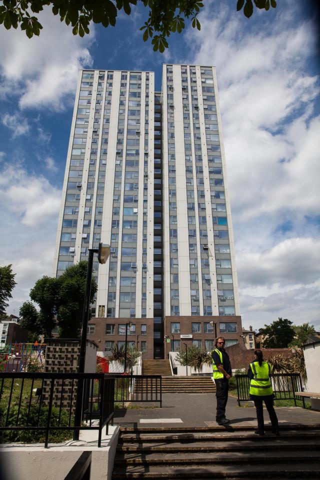  Police outside Chalcots yesterday after it was found five of the tower blocks used the same cladding as Grenfell