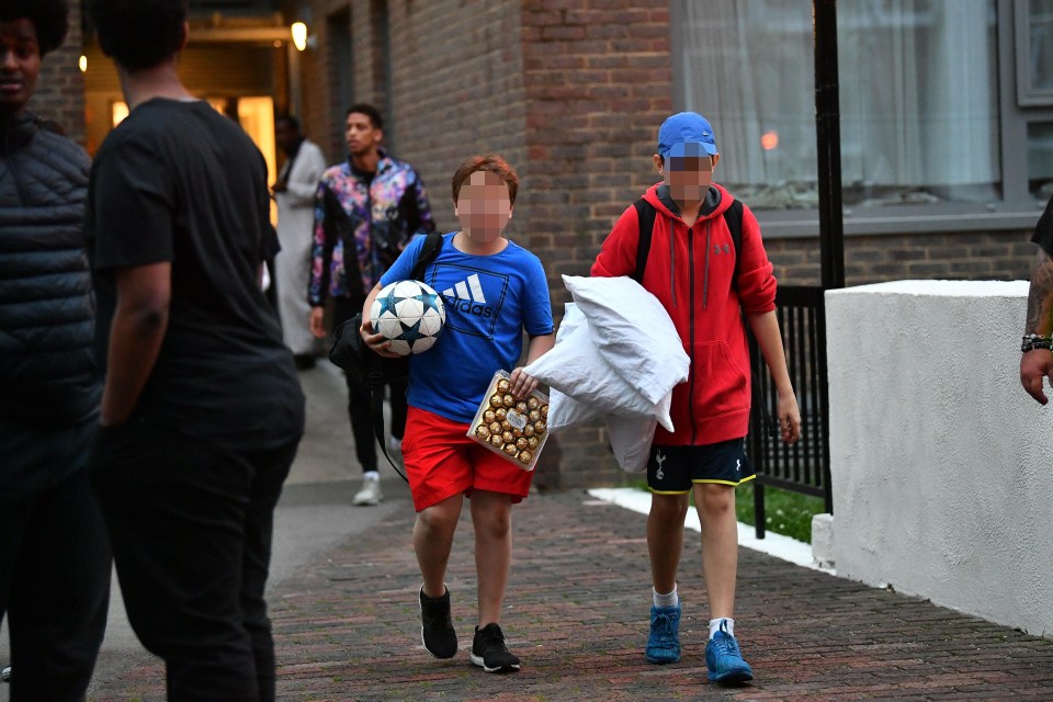 Children were seen clutching pillows as they left the tower blocks