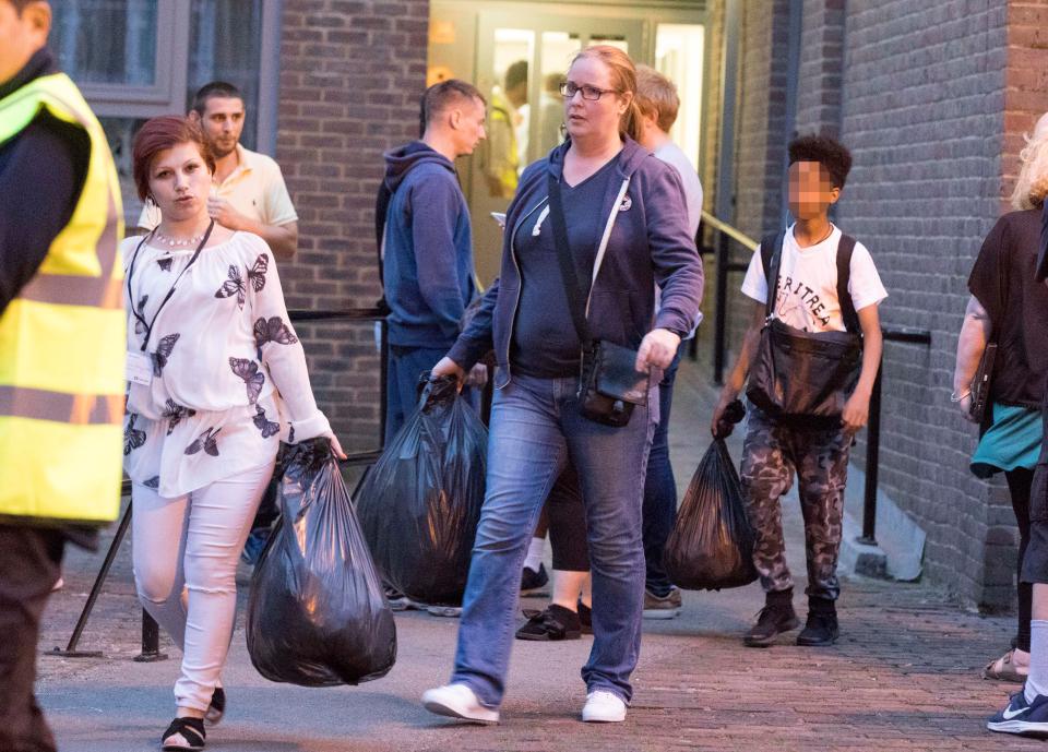  Some were clutching bin liners full of possessions following the last minute evacuation