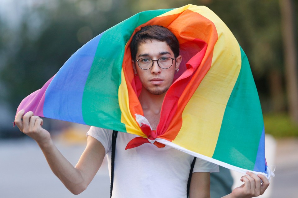 A protester openly defies the ban, which has been put in place for the past three years