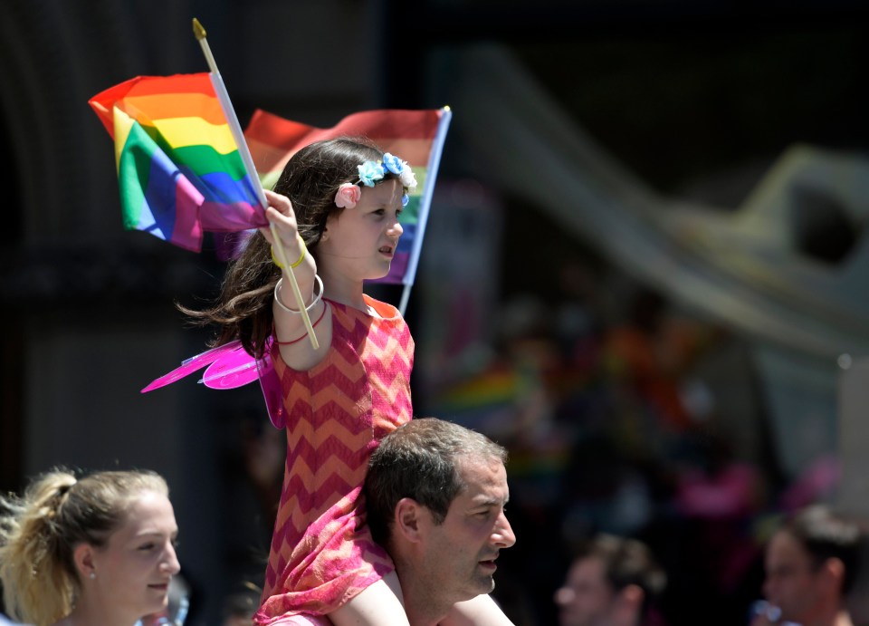 The march route ends where riots broke out in 1969 after police raided the Stonewall Inn, a gay bar