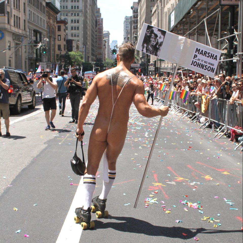  A sock secured by a thong and some roller skates are the only clothing this marcher needed