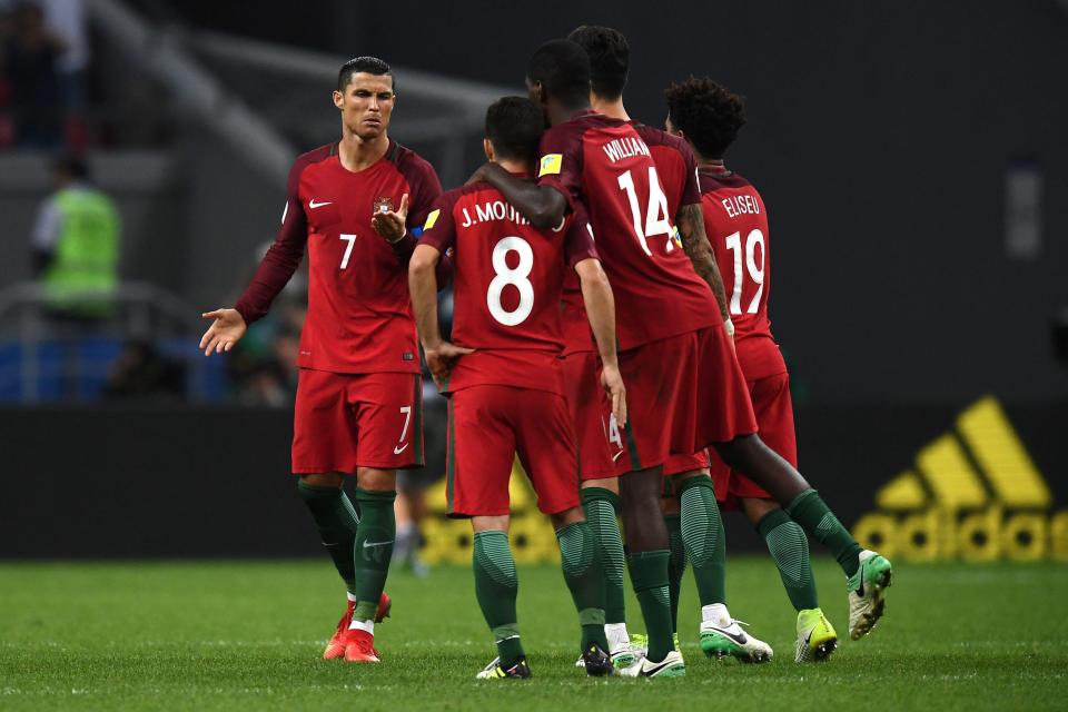  The Portugal squad react after they were sent crashing out of the Confederations Cup