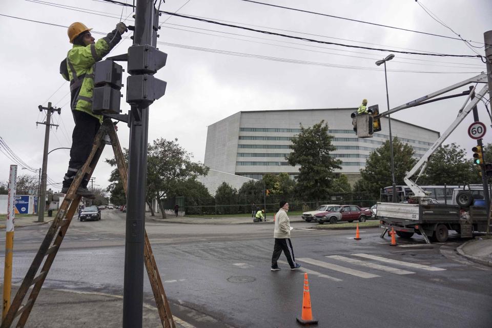  Maintenance work is carried out on traffic light in front of wedding venue