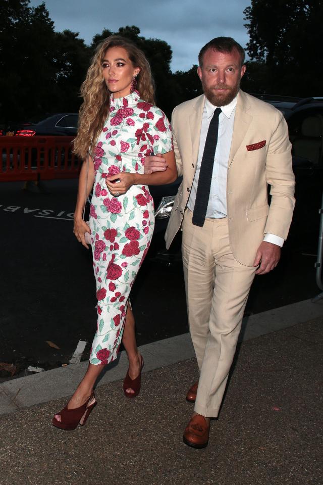  Guy Ritchie put in the effort in a cream suit