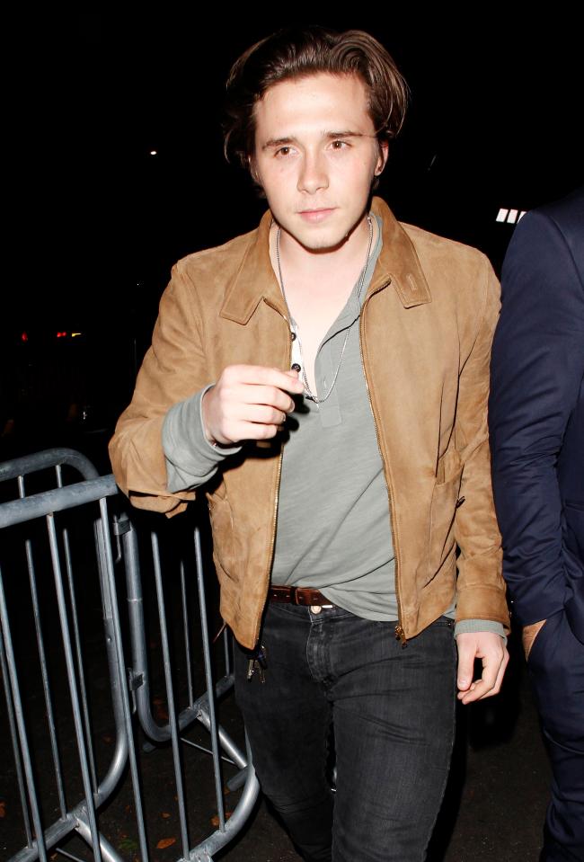  Brooklyn Beckham rocked up in a brown suede jacket