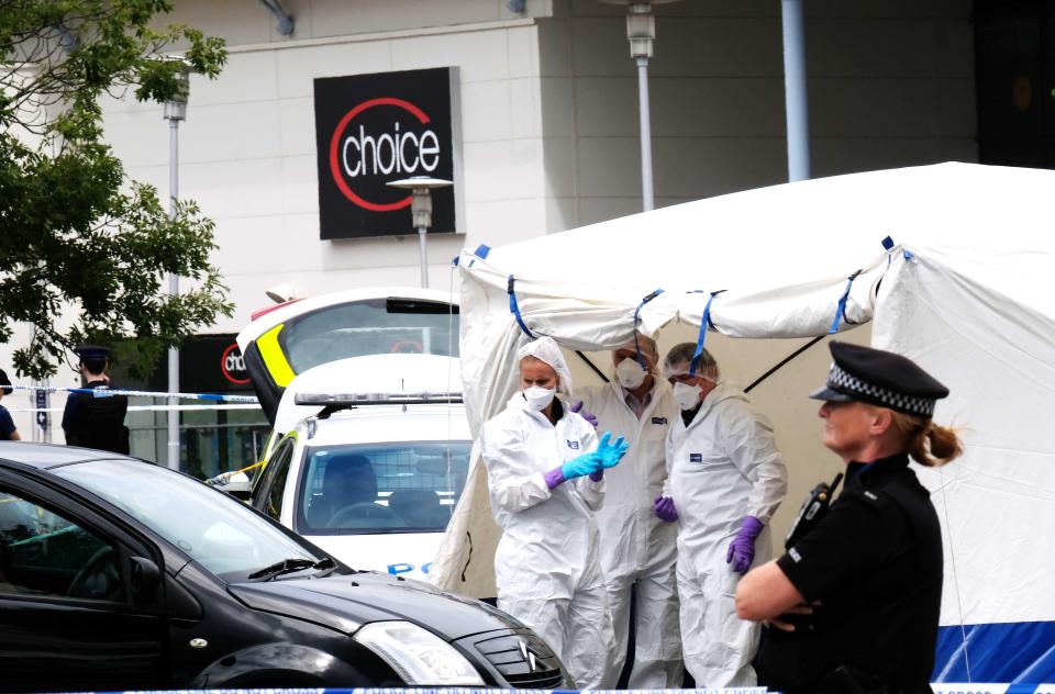  Forensic teams on the scene in Kent today after a woman's throat was reportedly slit