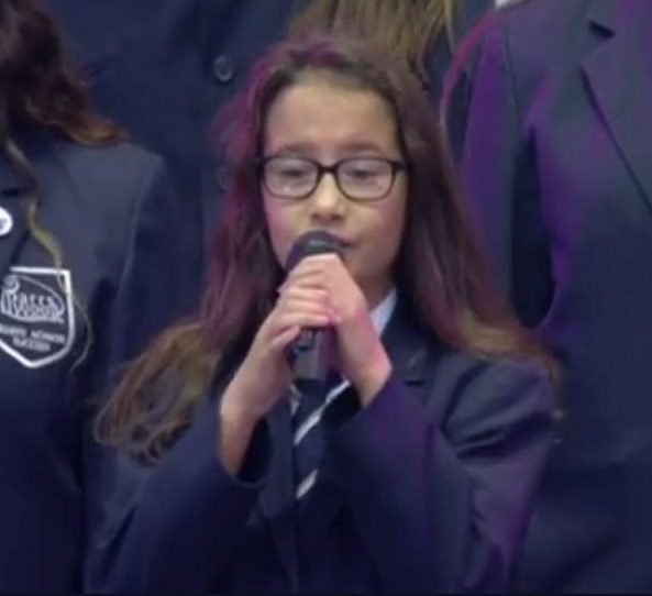  Natasha, 12, led her choir from Parrs Wood High School on stage in Manchester's Old Trafford cricket ground