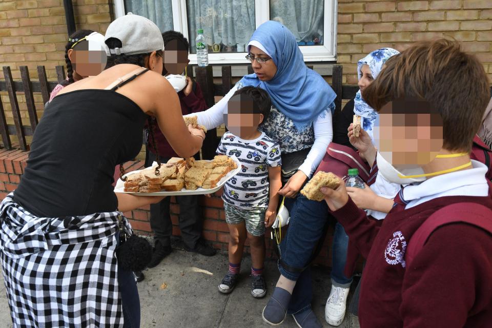  Families caught up in the catastrophe offered sandwiches from strangers in the community who have rallied to help