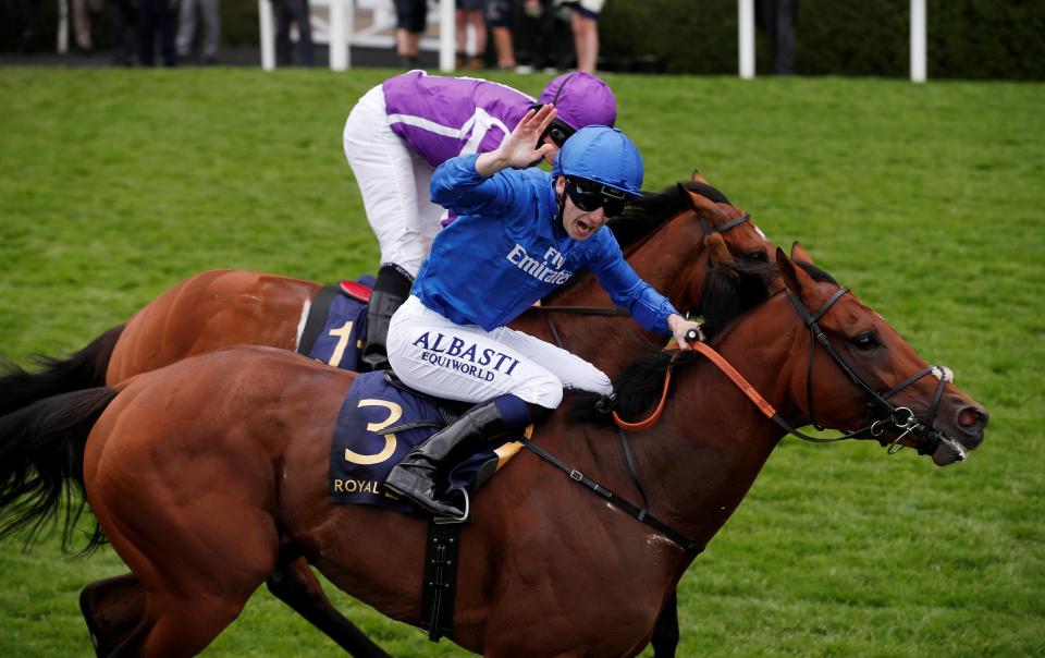  Oisin Murphy celebrates his win on Benbatl