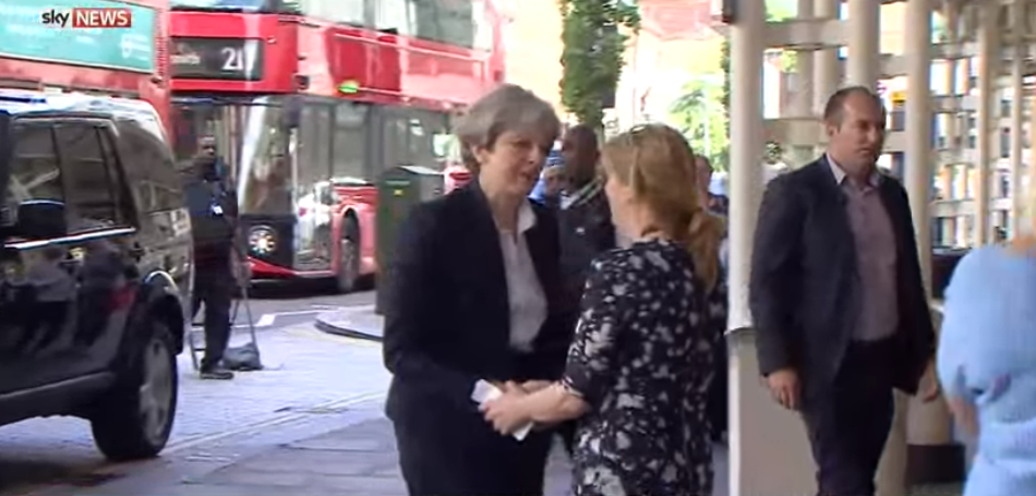  The Prime Minister is greeted by staff at the hospital who took her inside