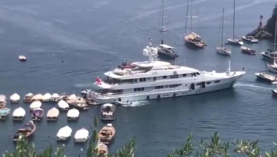  It crashes into multiple vessels while onlookers watched in shock