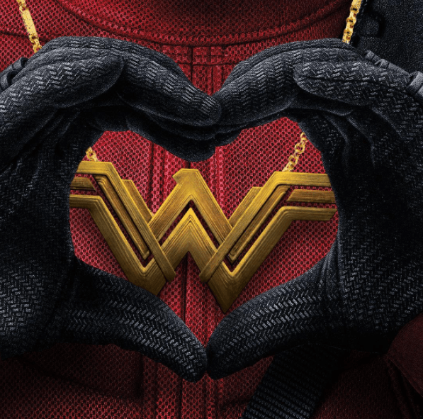  Canadian hunk Ryan posted a snap of Deadpool wearing a Wonder Woman medallion and making a love heart over it with his hands