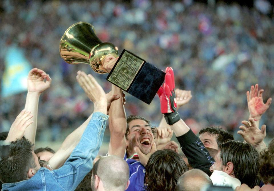  Fiorentina fans run onto pitch to celebrate with fans after 2001 Coppa Italia success