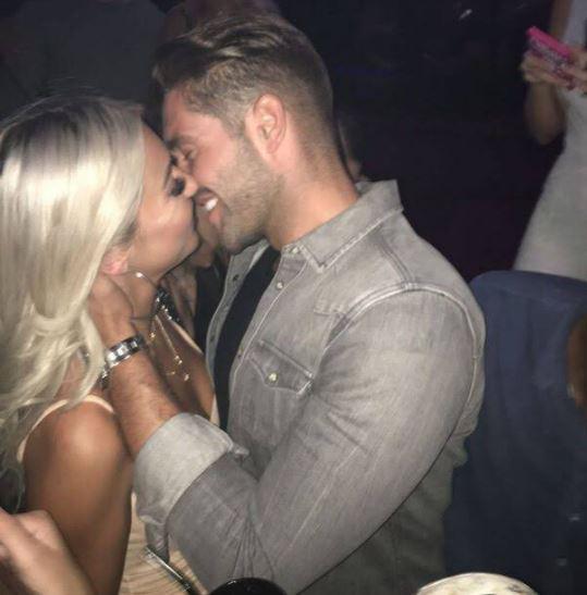  The pair are clearly getting close as Theo Mitchell catches them kissing