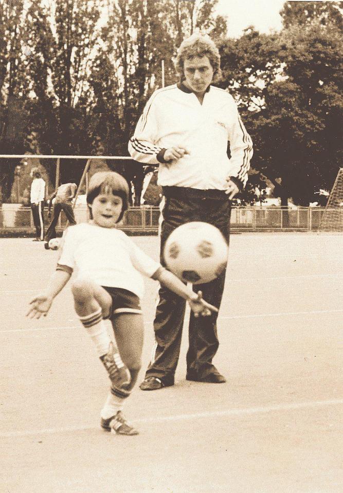  Harry keeps a keen eye on son Jamie as the lad practices his skills